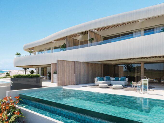 Nuevos apartamentos y adosados en primera línea de playa en venta en Marbella con piscina infinity