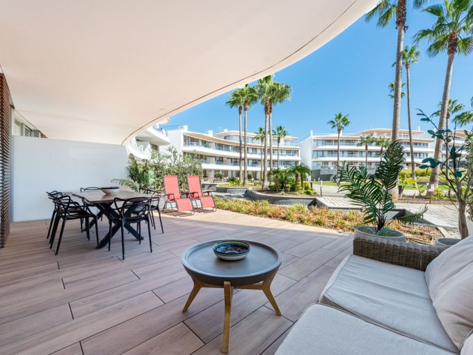 Covered terrace Beachfront Apartment with Sea View for Sale in Estepona