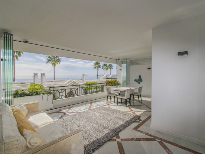 Covered terrace First line Beach Apartment in Estepona for Sale