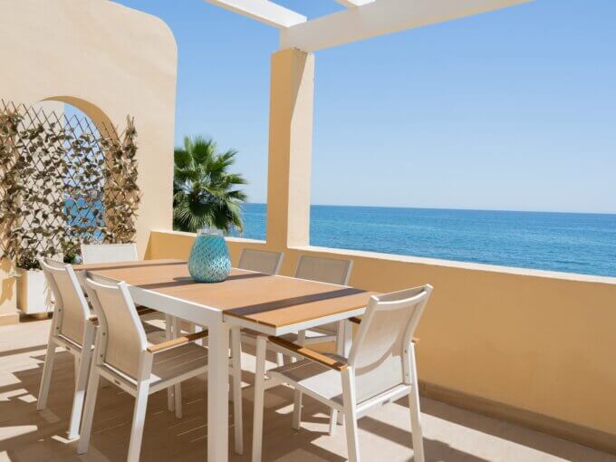 Outdoor table Frontline Beach Apartment for Sale in Estepona