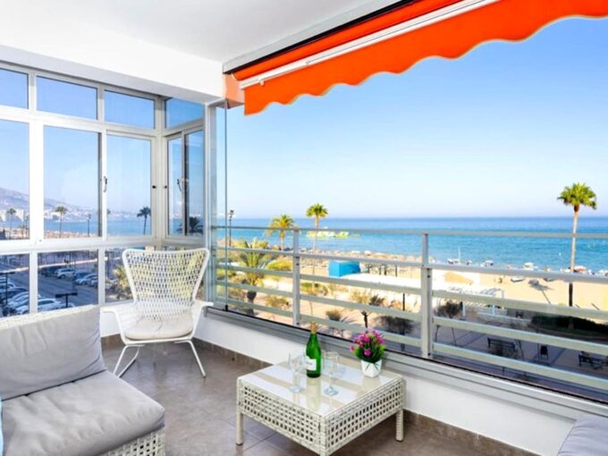 Covered terrace Beachfront Apartment for sale in Los Boliches. Property for sale in Marbella.