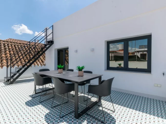 Outdoor table Renovated Townhouse for Sale in Estepona. Real estate for sale in Marbella.