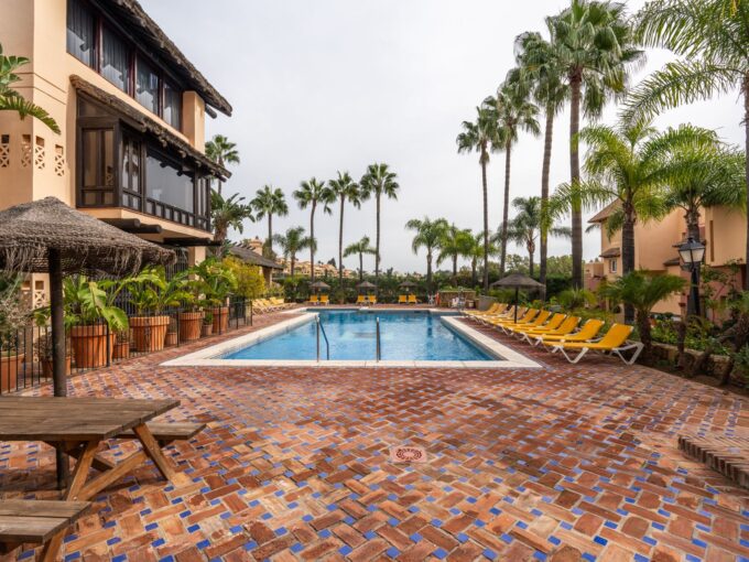 Pool area Townhouse in Condes de Iza for Sale. Real estate for sale in Marbella.
