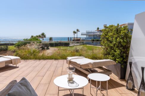 Garden Beachfront Garden Apartment in Estepona for Sale. Property for sale in Marbella.