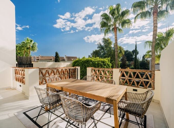 Outdoor table Elegant Townhouse for Sale in Los Pinos de Aloha. Property for sale in Marbella.