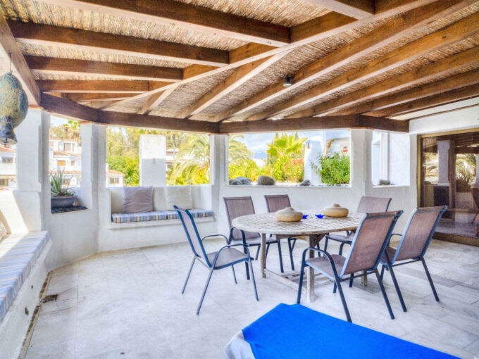 Covered terrace Refurbished Beachside Apartment in Elviria for Sale