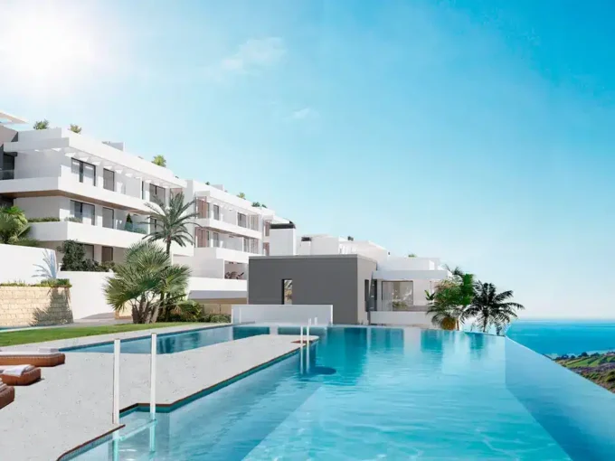Pool area New Apartment in Manilva for Sale. Real estate for sale in Marbella.
