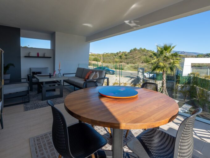 Outdoor table Apartment for Sale with Top Amenities in Selwo, Estepona, Marbella