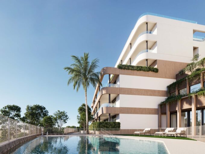Pool area New Golfside Apartment in Estepona for Sale. Real estate for sale in Marbella.