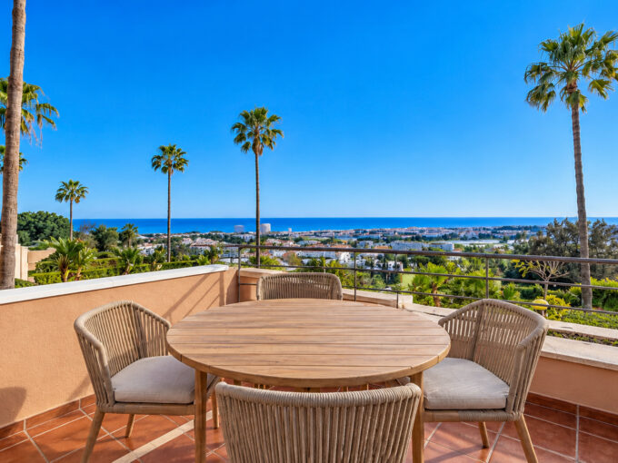 Terrace view of 2-bedroom apartment for Sale in Magna Marbella, Nueva Andalucía - fully renovated and with panoramic sea views